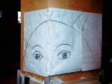 decorazione artistica occhi su mosaico a muro in progettazione